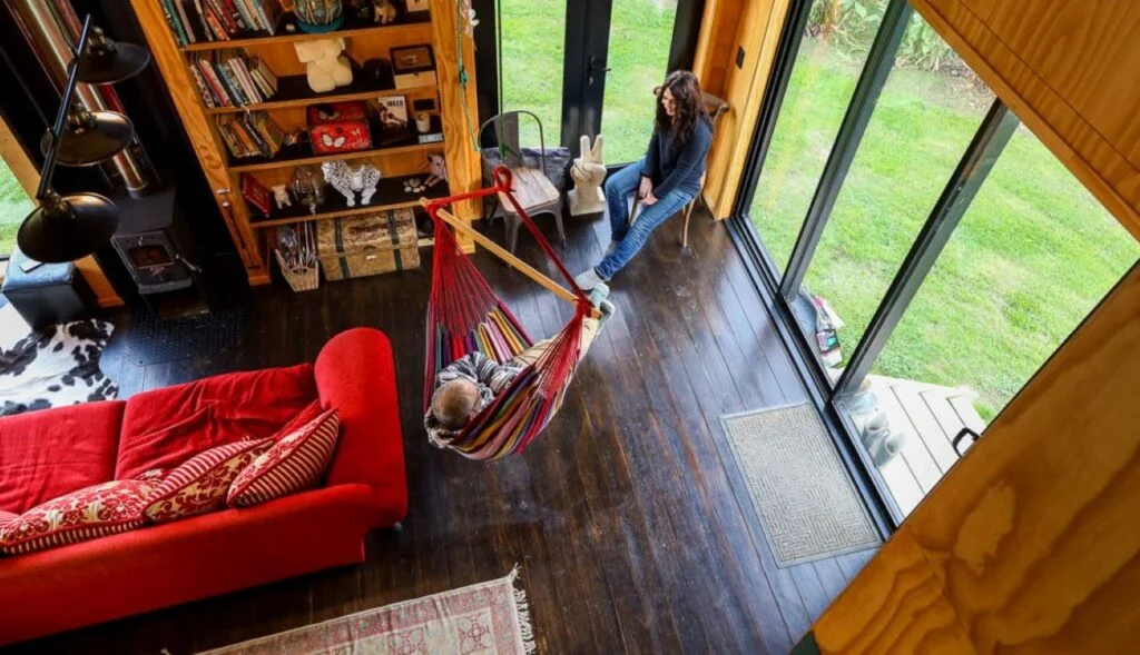 8 Breathtaking Modern Cabin Houses examples-Living Off the Grid Black Cabin House