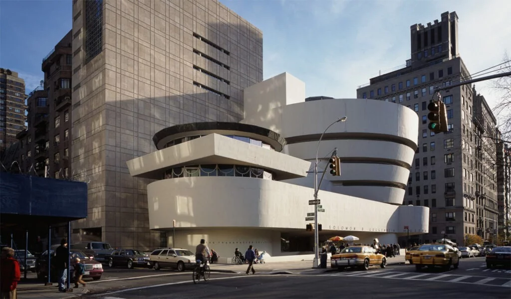 10 Best Examples of Museum Architecture and Design Embedded in the topography, this museum architecture reveals different elevations, reacting to its immediate context. The steep slope of the site creates an intimate, shaded entrance on the brow of the hill. On the highest terrace, the building appears as a pavilion, providing the entrance to the museum. Slender concrete supports articulate the façade and encloses the entrance. The route through the entrance pavilion gradually adjusts from daylight to artificial light, necessary for the fragile exhibits displayed.   Museum architecture,Museum design concept,Modern art,Art and architecture,Contemporary art