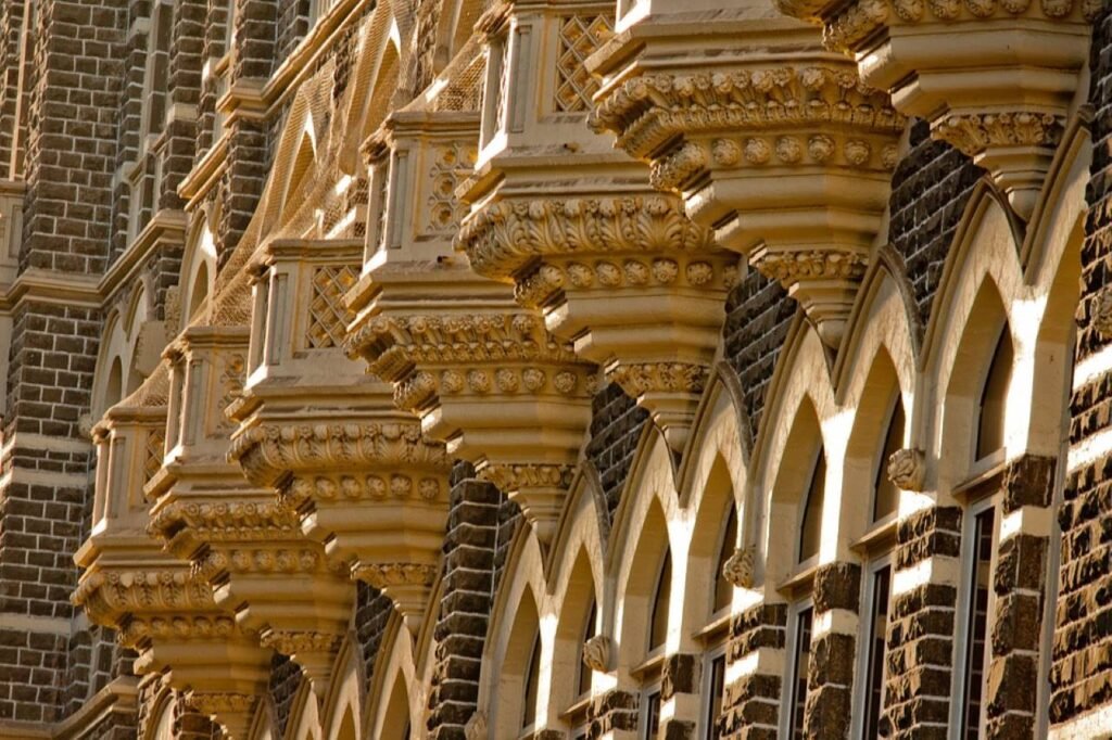 Mumbai Architecture: A Natural Mix of Architectural Styles Mumbai Architecture: A Natural Mix of Architectural Styles Bombay City, which is referred to today as 'Mumbai', started as a congregation of seven islands, gifted as a dowry in 1661 to the King of England. In 1667, these islands were handed out to The East India Company for 10 pounds every year, after which the development of Bombay began. During this time, The East India Company was just a trading company and India wasn't under British rule. The inauguration of Mumbai Architecture was done by the British. They started with the fortification of the main island for protecting their land. This area was later called 'fort', which lies near the current-day CST Station. Mumbai architecture,Modern style architecture,Art Deco in architecture,Building design,Architecture and design