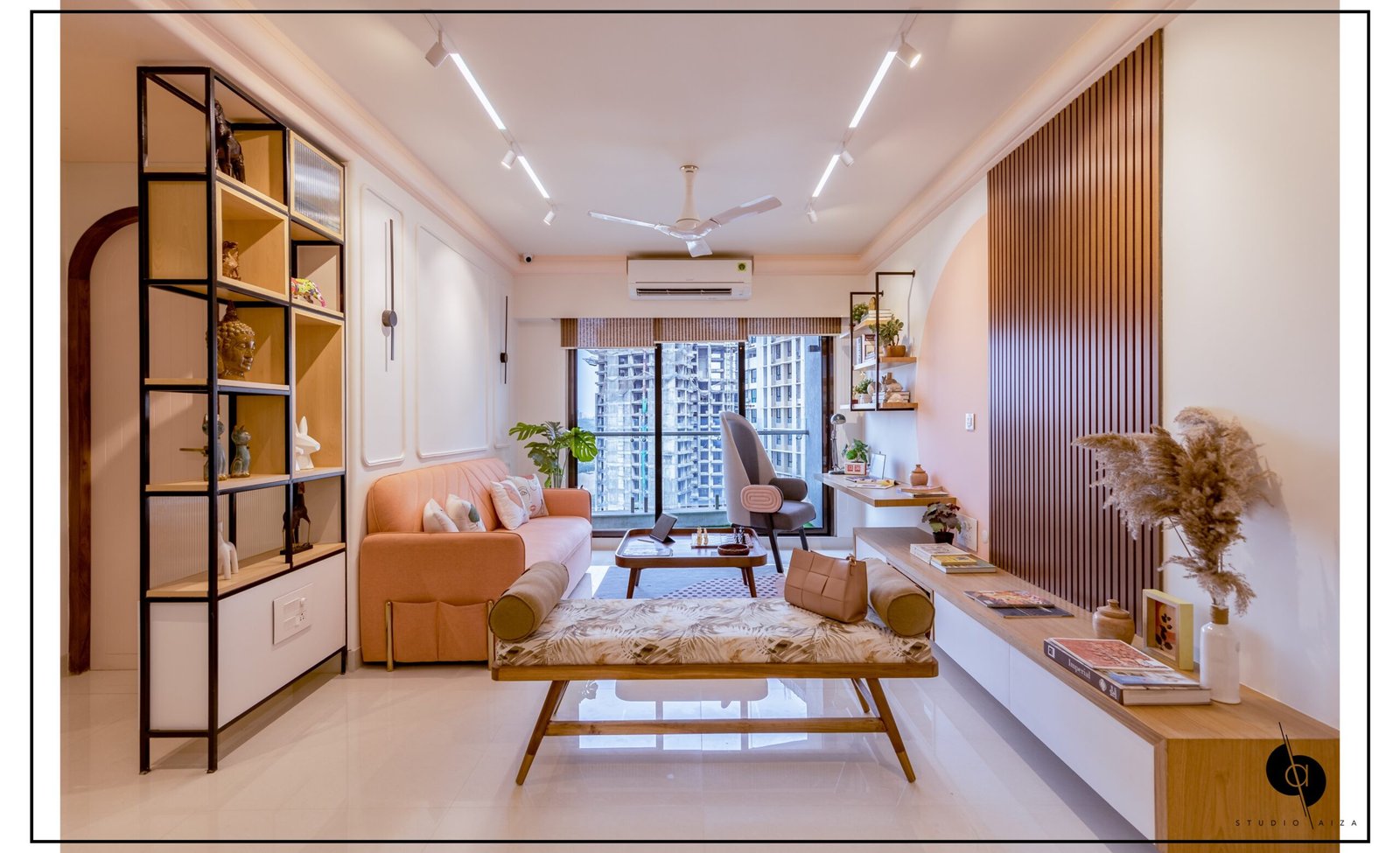 Nayak's Residence: Interior Design Project by Studio Aiza The Nayak's home is a journey of colours that creates a feeling of awe starting from the entry wall. The Terracotta coloured arched safety door, with the bold nameplate brings in a sense of free flow to the entrance. It is perfectly balanced with the Lord Ganesha idol placed in a circular stamp to the right and you feel the blessing extended to everyone who enters the home. Nayak,design,architecture