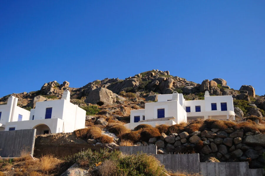 Cycladic Architecture: An Alluring Architecture of Mykonos Cycladic Architecture: An Alluring Architecture of Mykonos Mykonos is perhaps the most cosmopolitan of the Cyclades islands and one of the most beautiful examples of ancient Cycladic architecture. Classical and cubic houses featuring flat roofs, wooden coloured doors, and windows generate a distinctive ambiance that reflects the primary aspects of the traditional design, which is now famous worldwide. Despite its expansion as a tourist destination, Mykonos has a distinct Cycladic identity. Cycladic Architecture,Mykonos,design